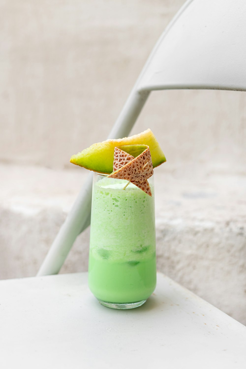 a green drink with a star on top