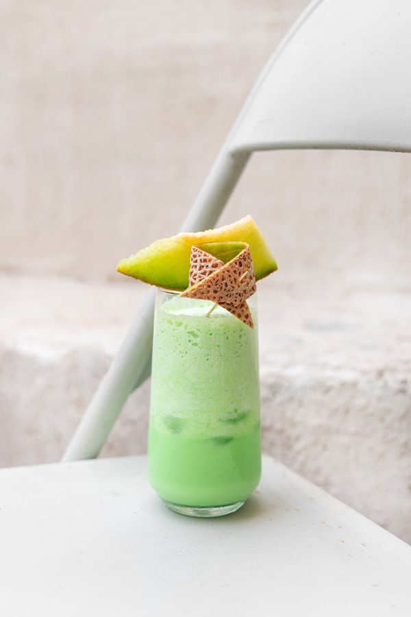 A green drink with a star on top