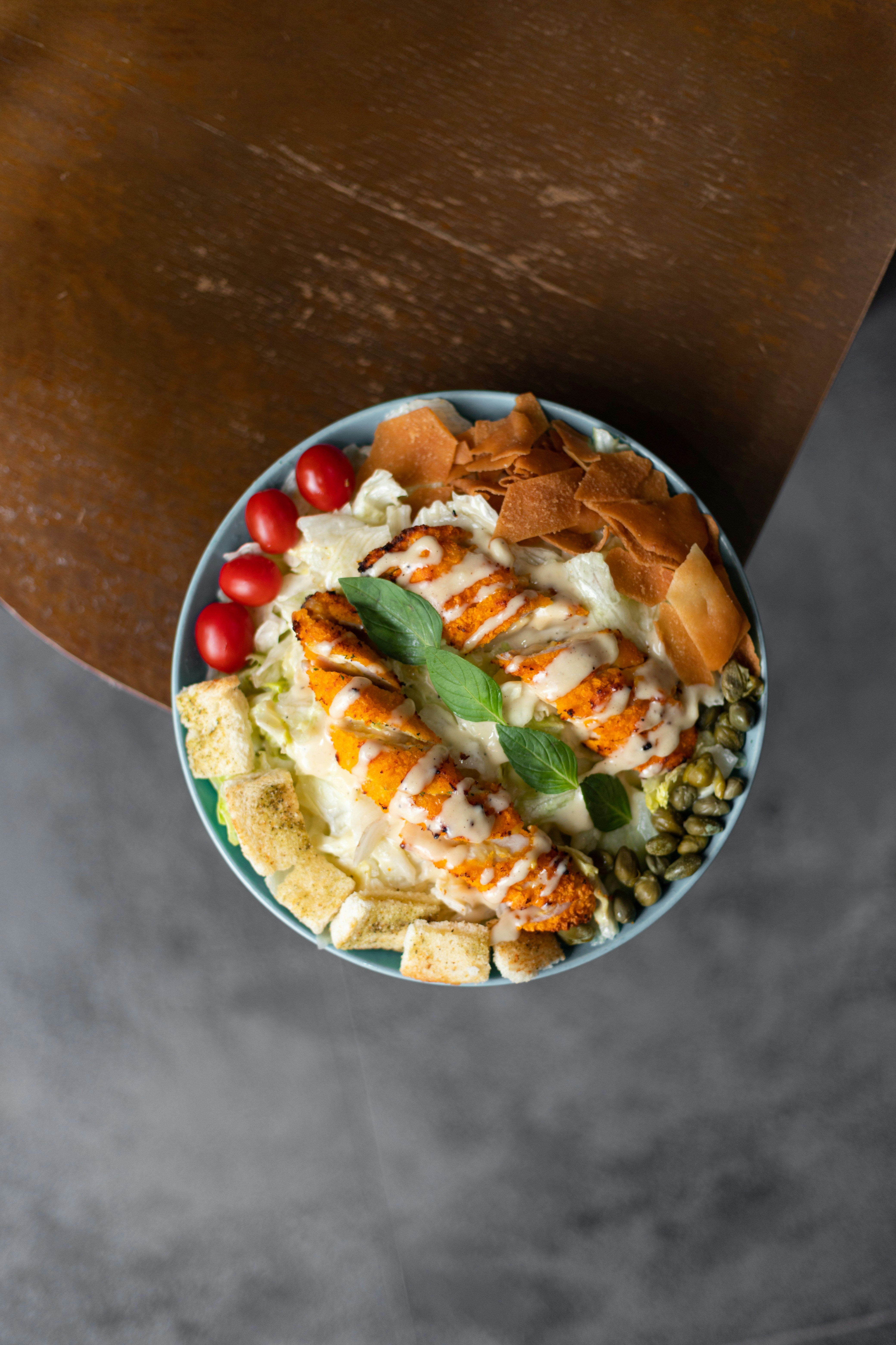 a plate of food on a wooden table
