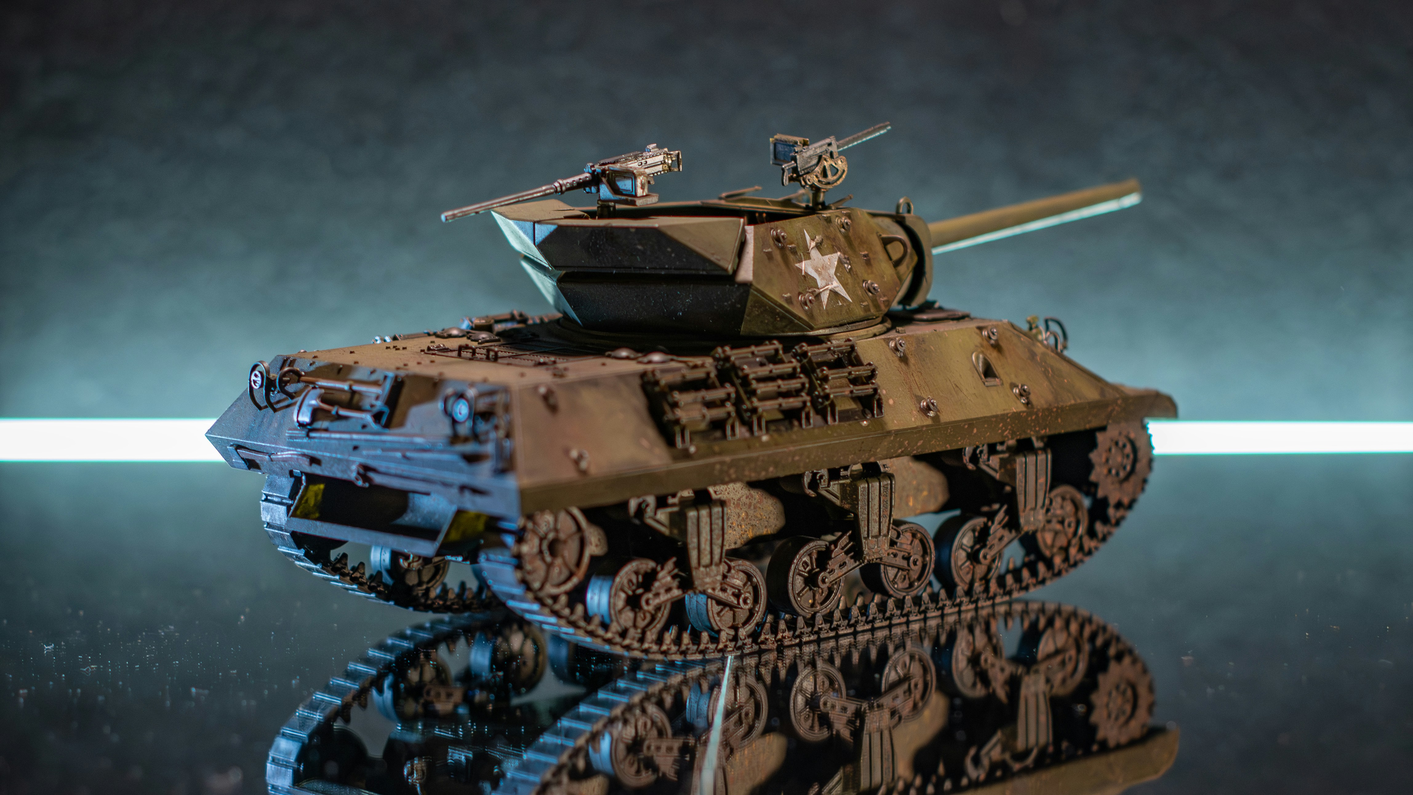 a toy tank is shown on a reflective surface