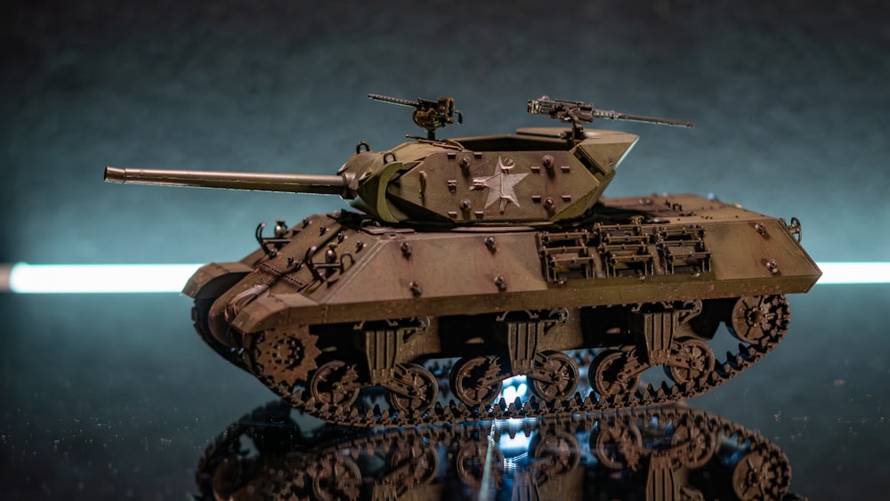 a model of a tank on a reflective surface