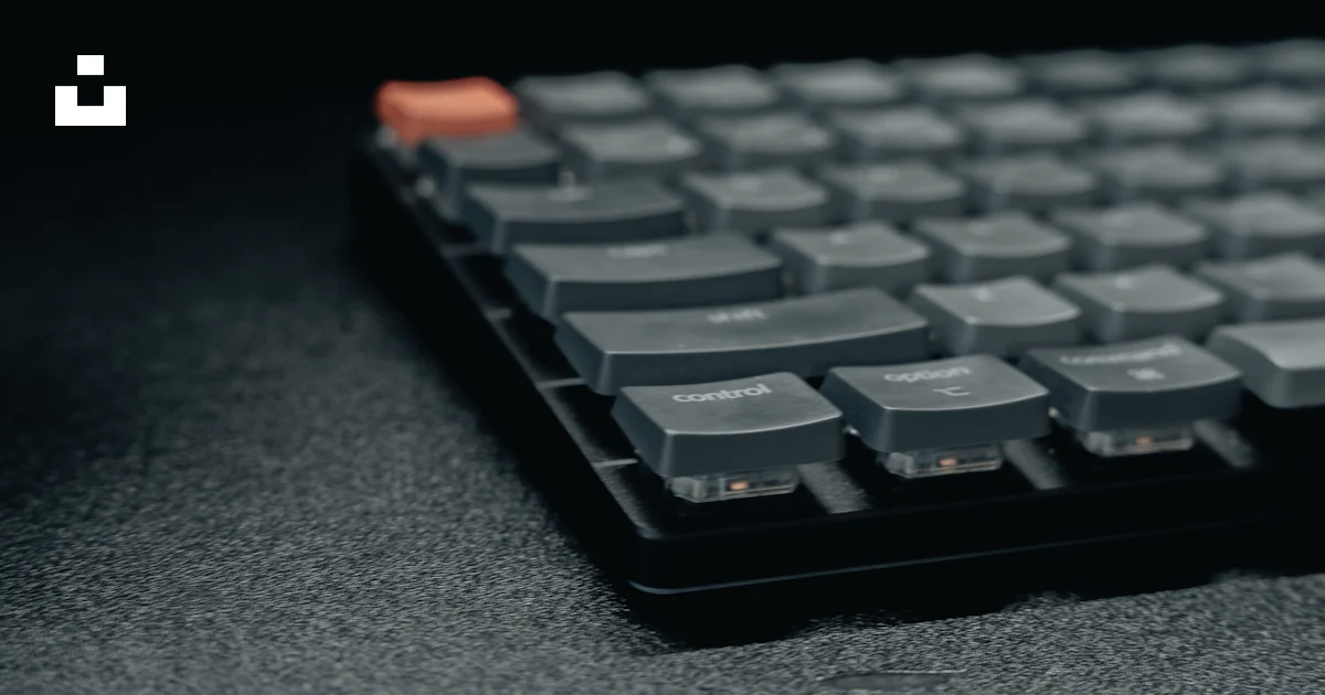 A close up of a computer keyboard on a table photo – Free Keybard Image ...