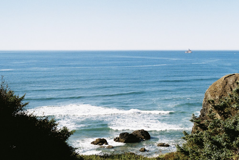 a view of the ocean from a cliff