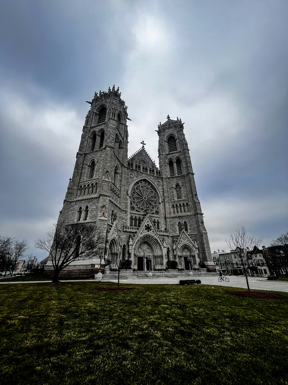 a large cathedral with two towers on a cloudy day