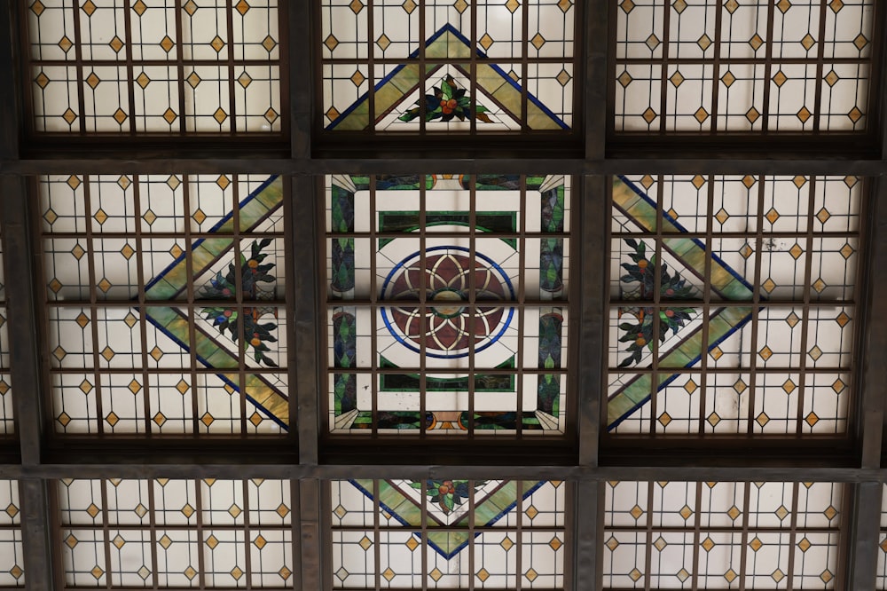 a stained glass window in the ceiling of a building