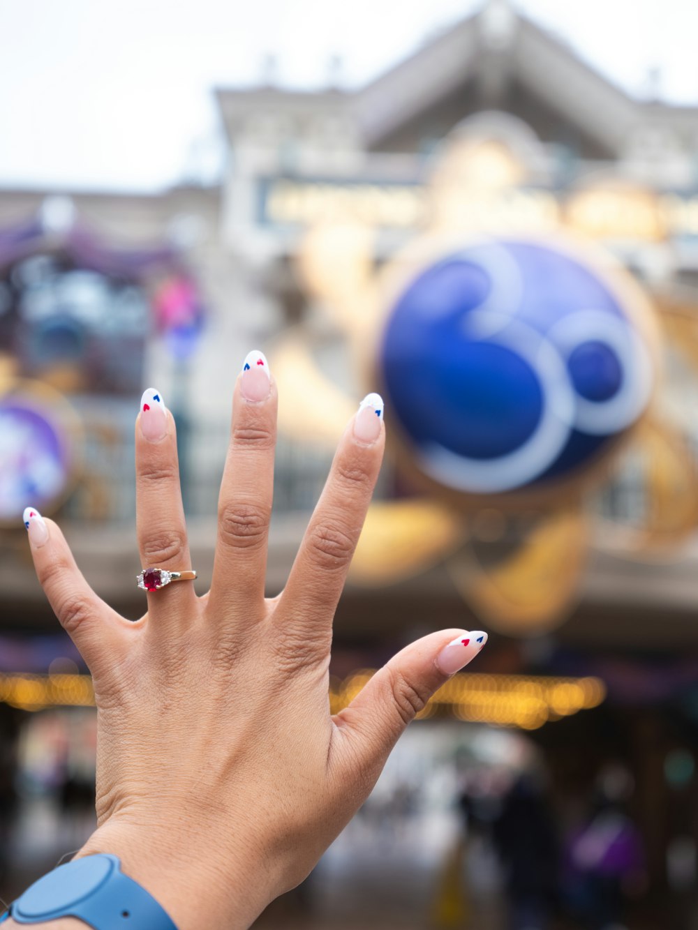 a woman's hand with a ring on it