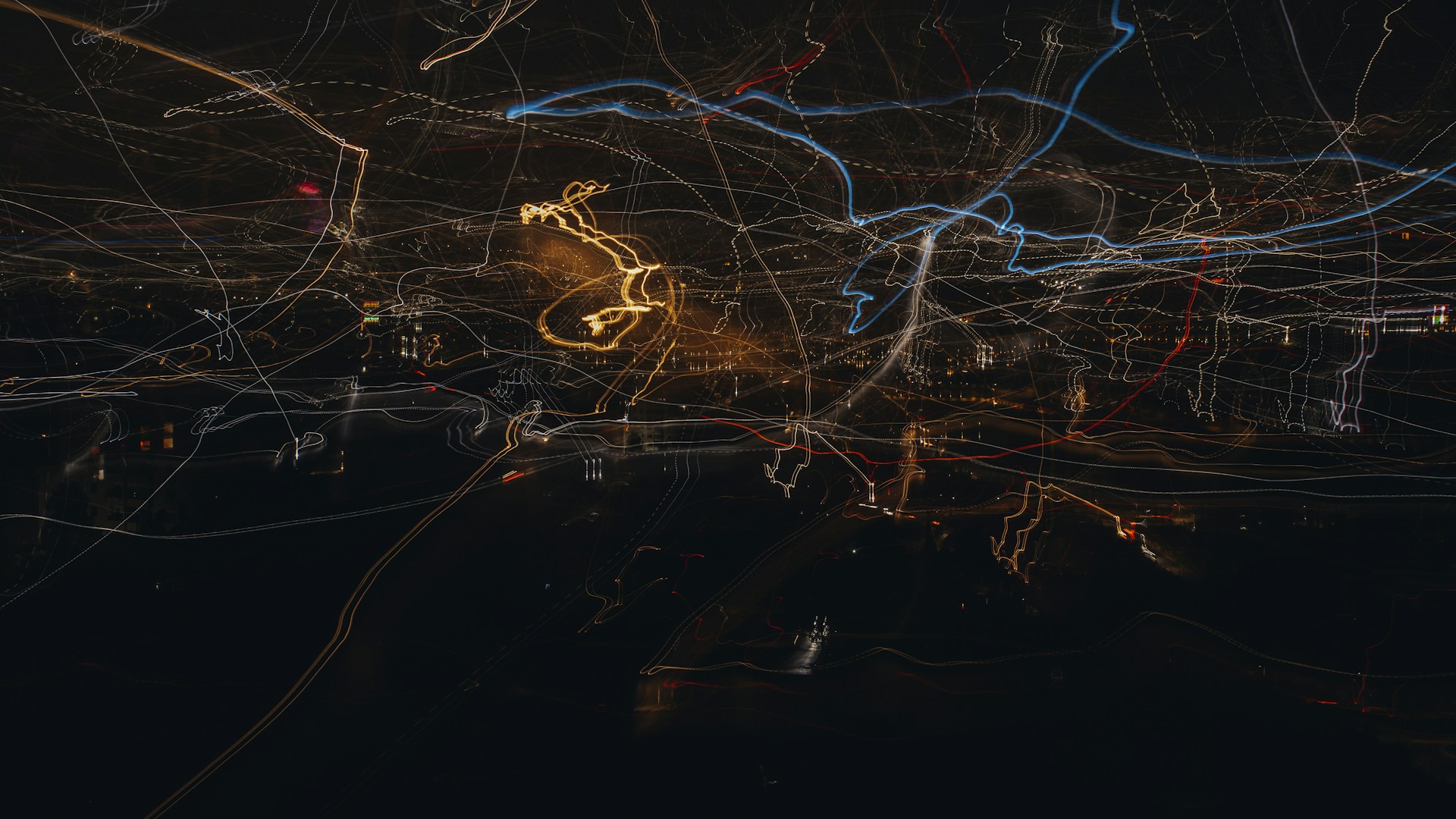 an aerial view of a city at night