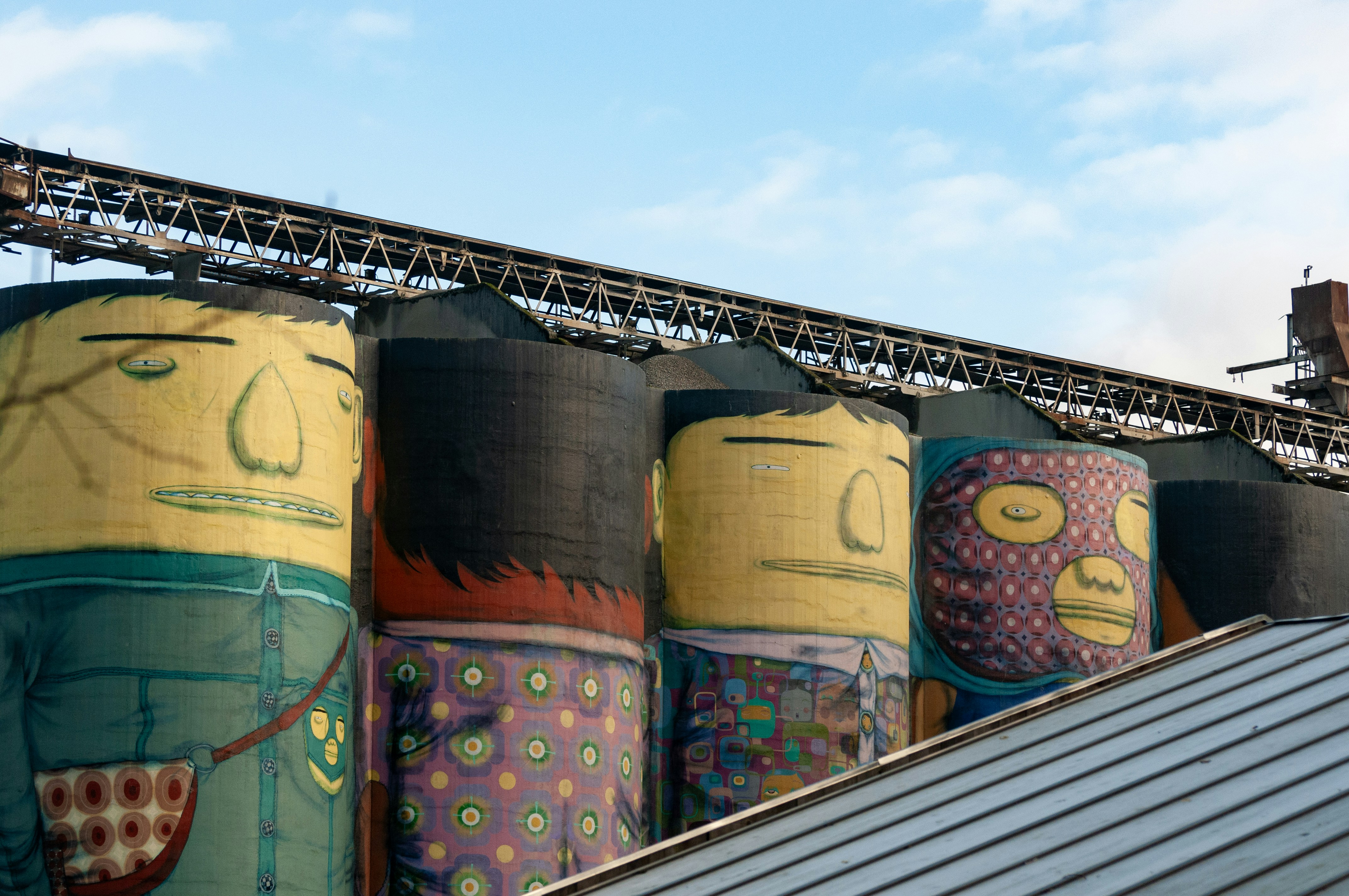 Image shows decorative storage silos.