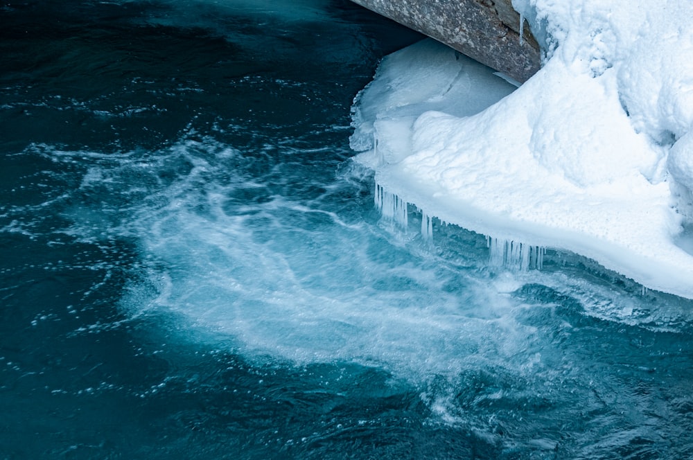 the water is crystal blue and the ice is melting