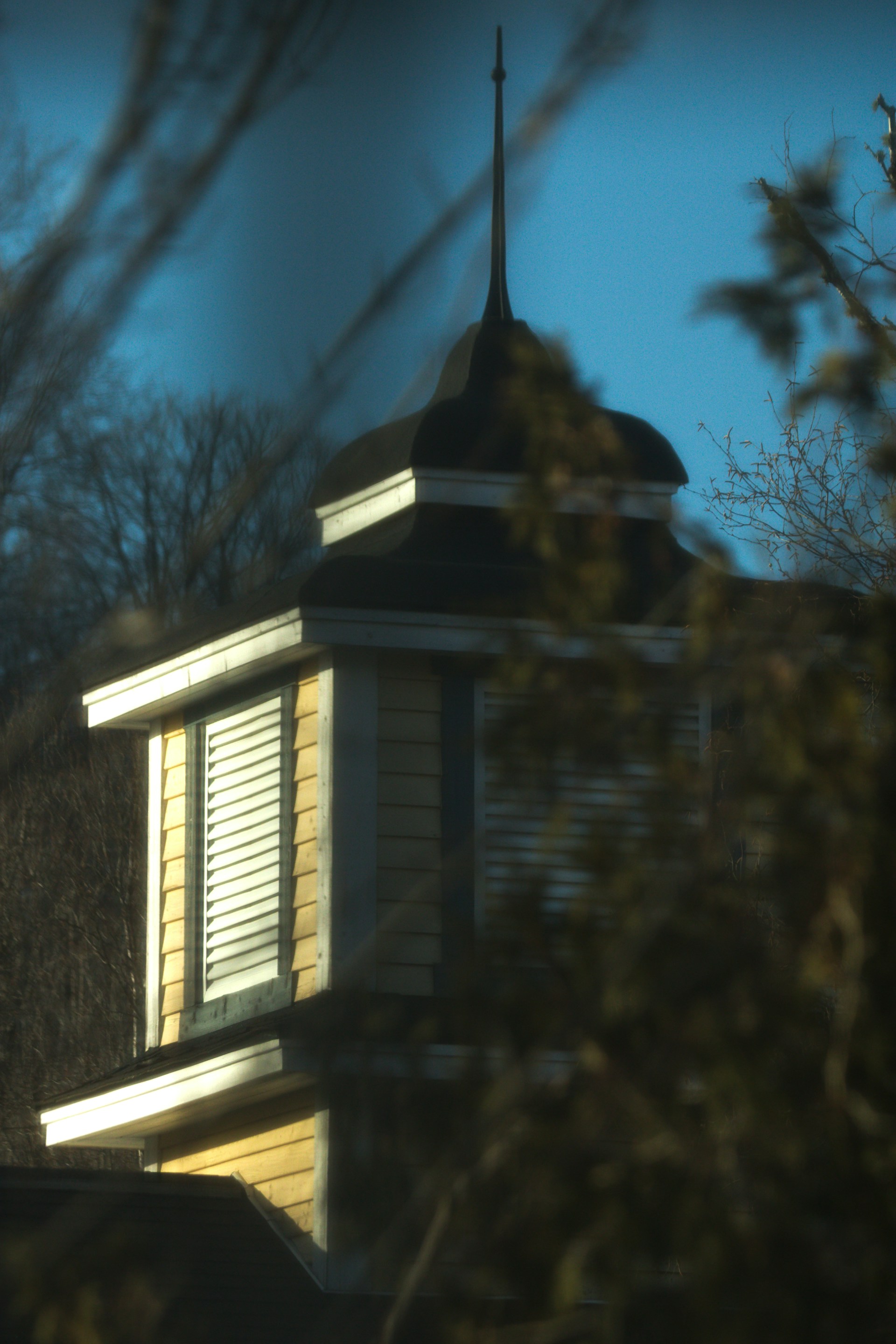 a building with a clock on the top of it