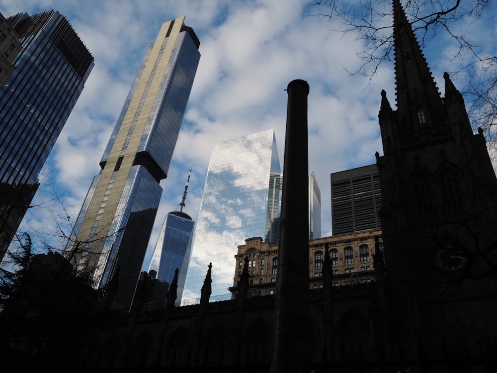 a group of tall buildings sitting next to each other