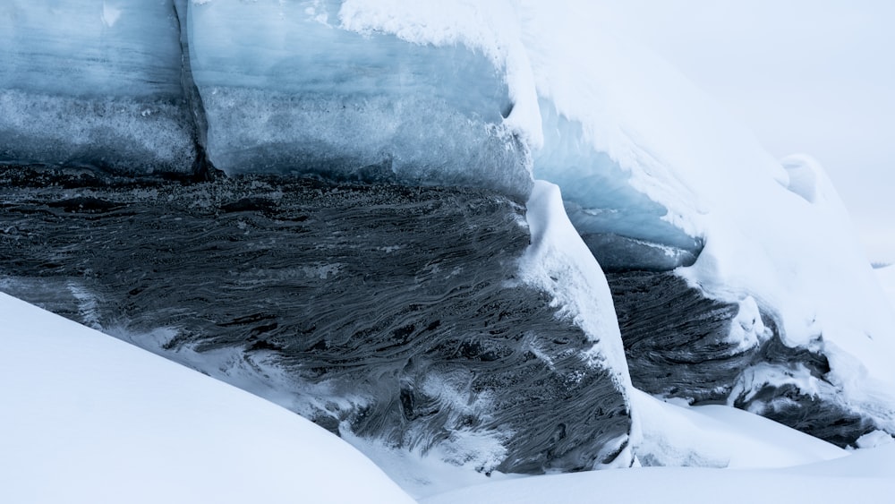 a large iceberg that is partially submerged in the water