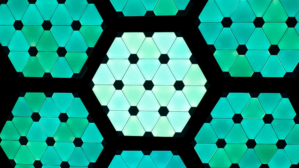 a pattern of hexagonal shapes in green and blue