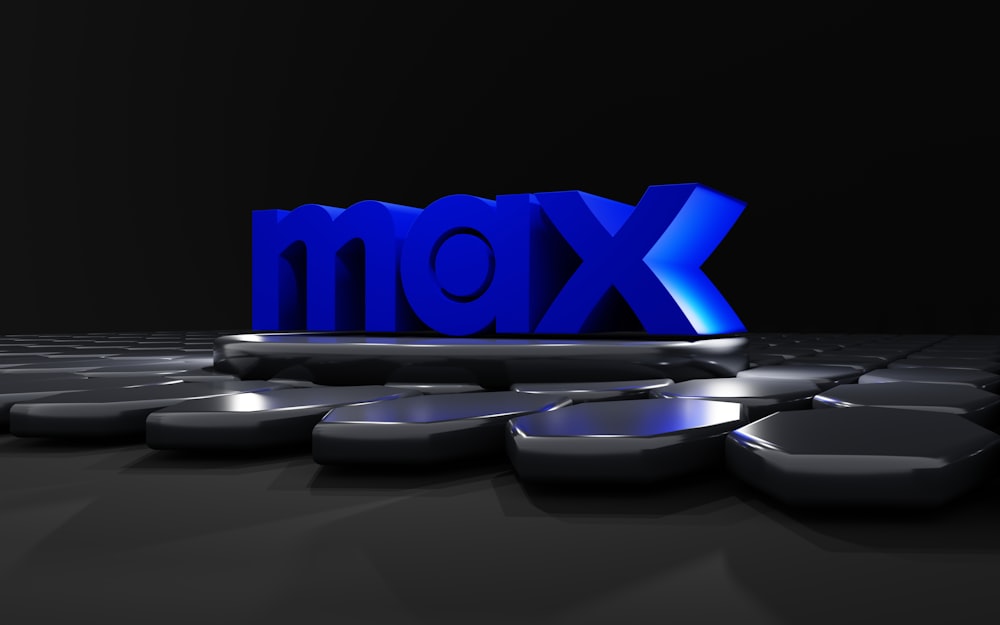 Eine 3D-Wiedergabe des Wortes XOM auf schwarzem Hintergrund