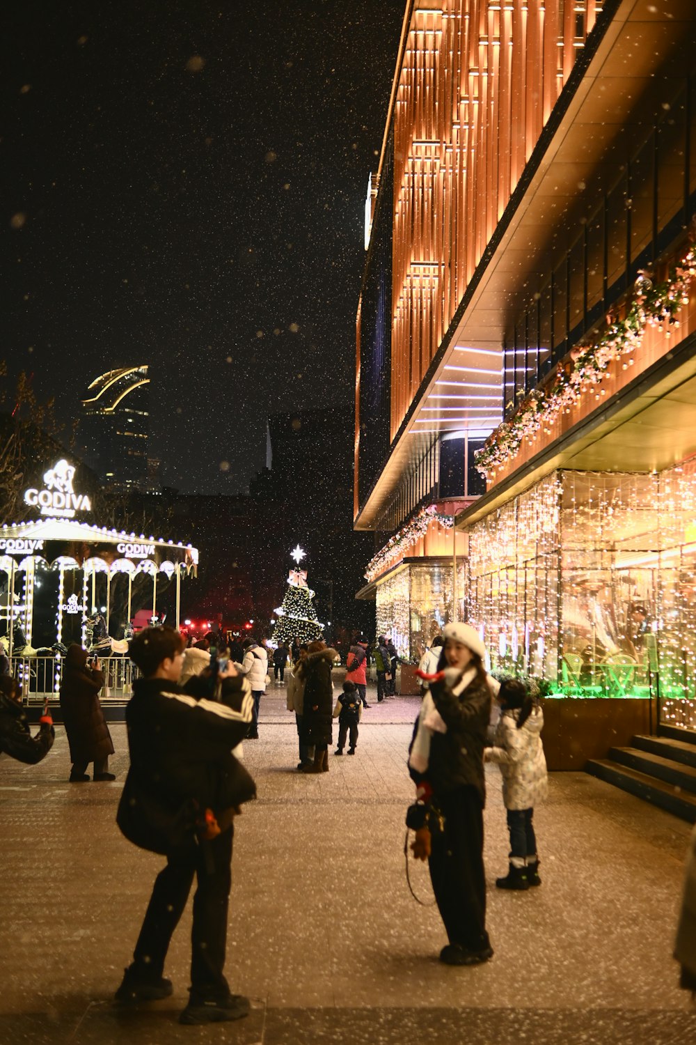 a couple of people that are standing in the street