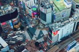 an aerial view of a city with lots of tall buildings