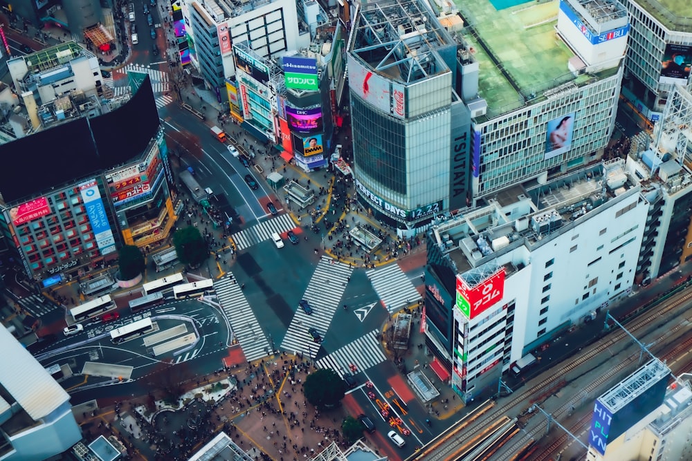 an aerial view of a city with lots of tall buildings