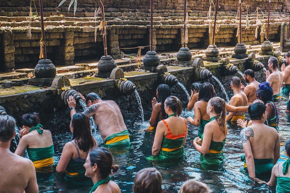 a group of people in a body of water