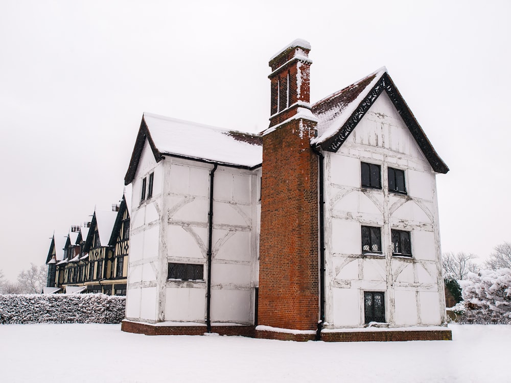 a large white building with a clock tower on top of it