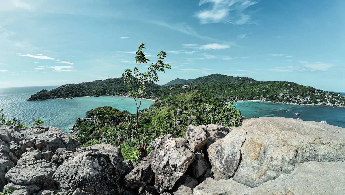 Freedom Beach and Shark Bay seen from a rocky viewpoint on Koh Tao