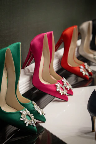 a row of women's high heel shoes on display