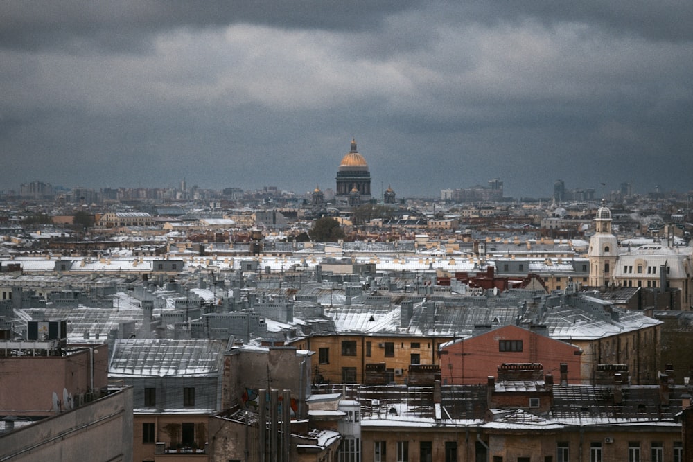 a view of a city with a dome in the distance