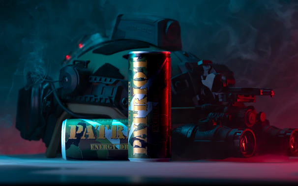 a can of energy drink next to a robot