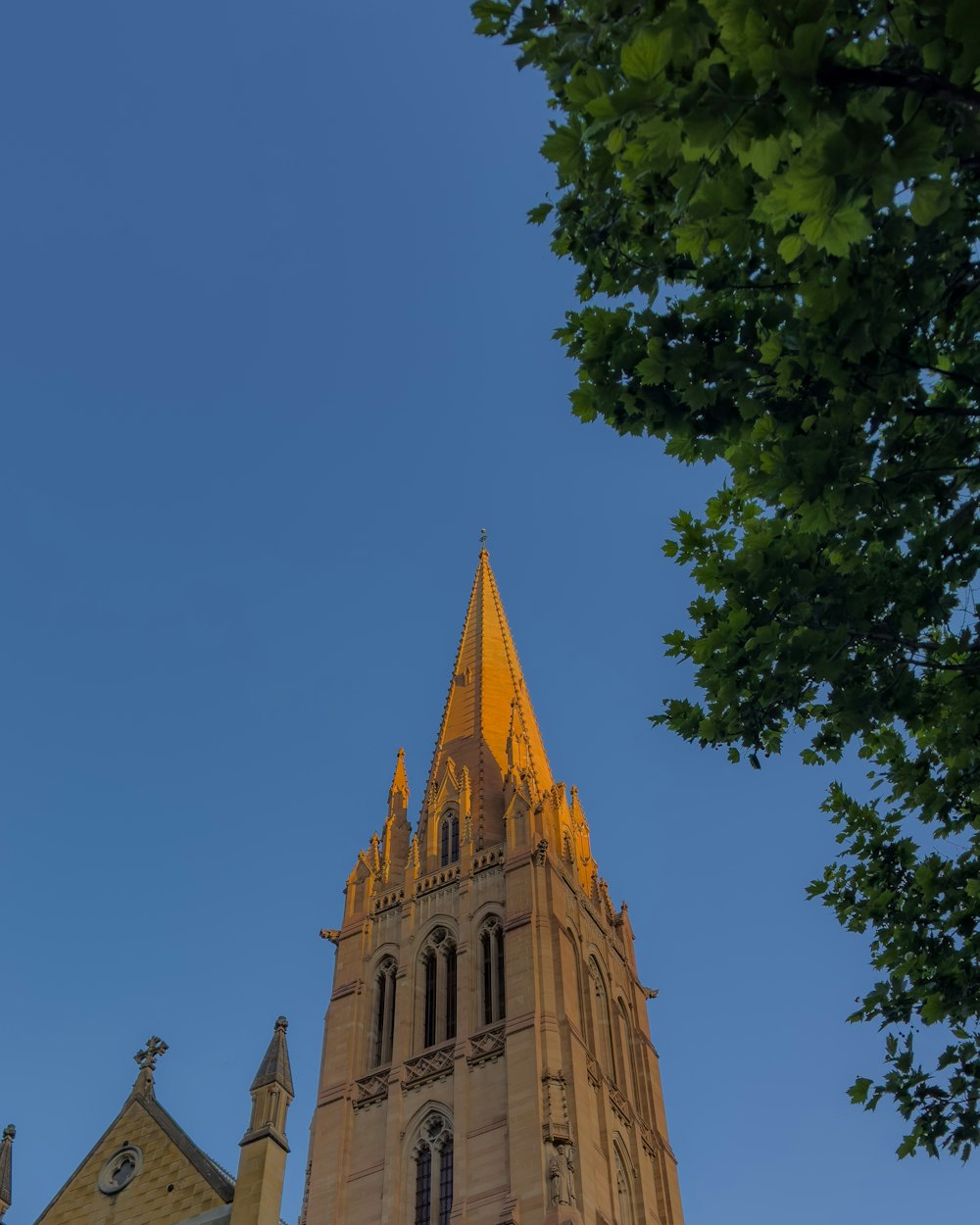 a tall tower with a clock on the top of it