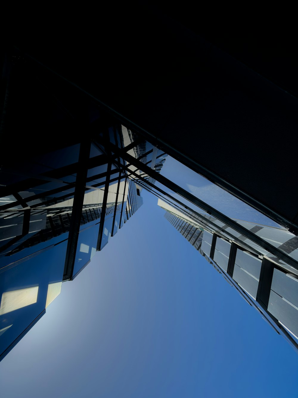 a very tall building with a sky background