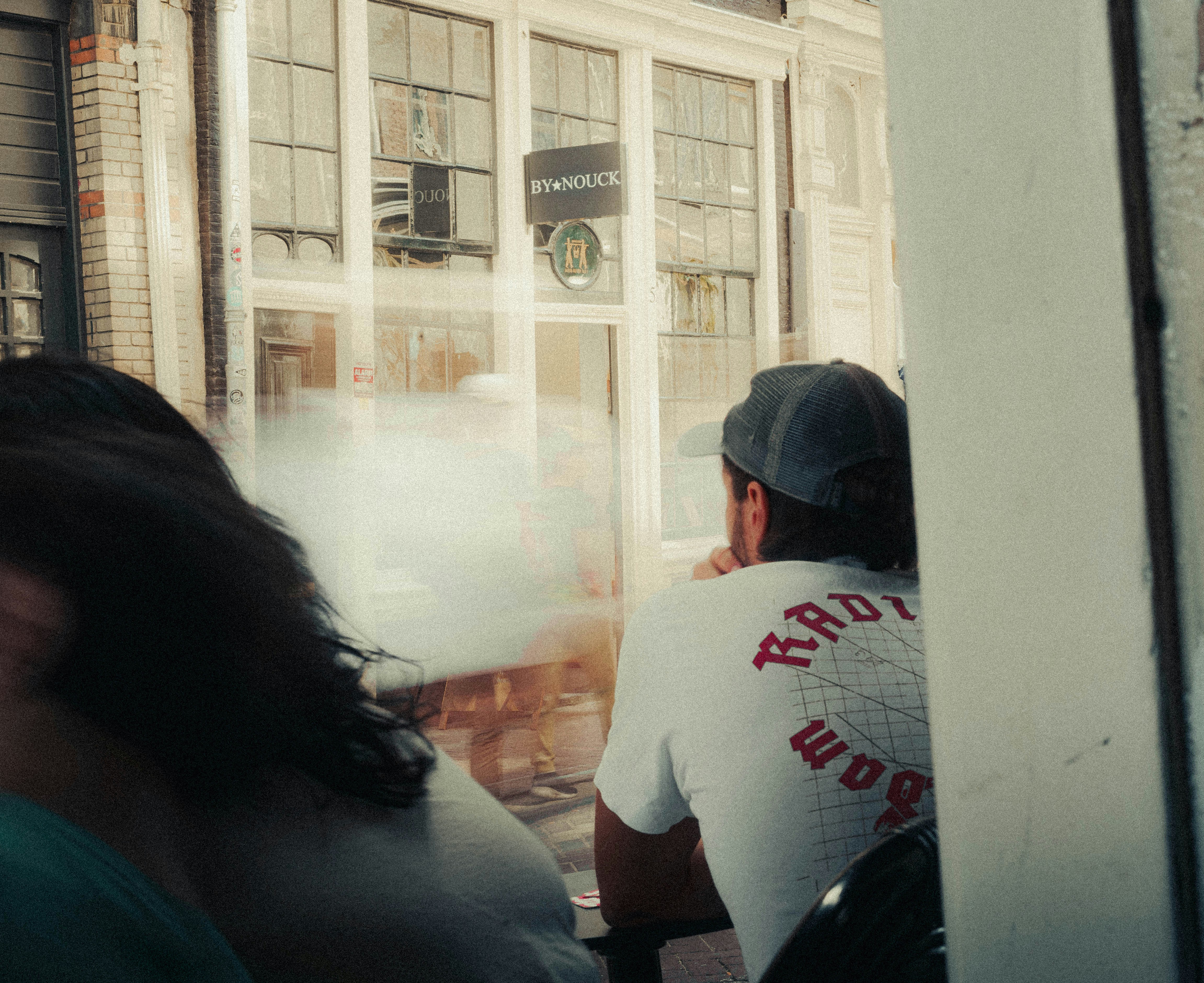 a group of people standing outside of a building