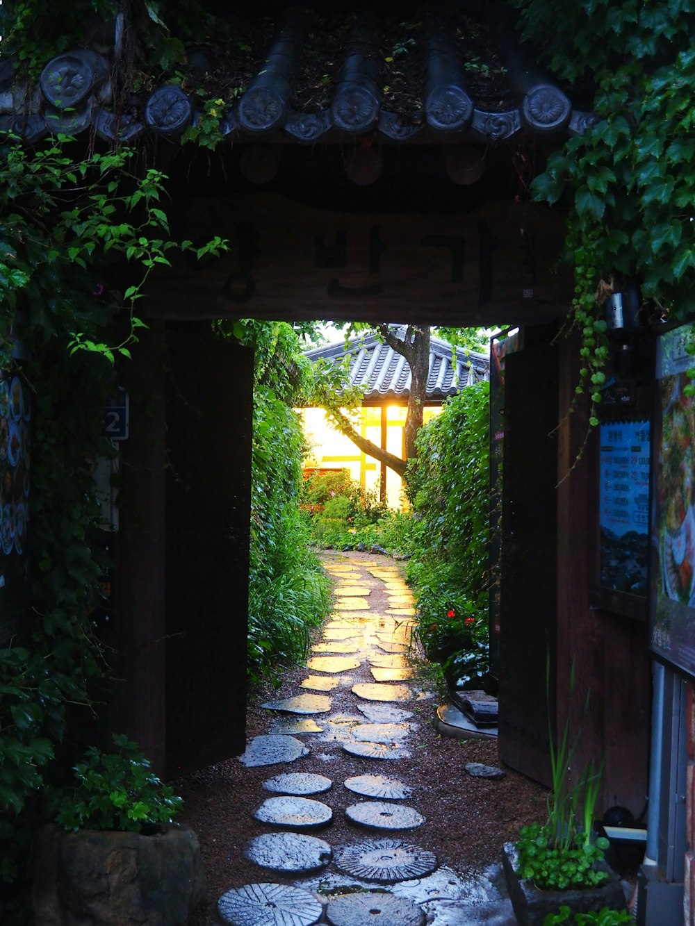 a stone pathway leads to a building