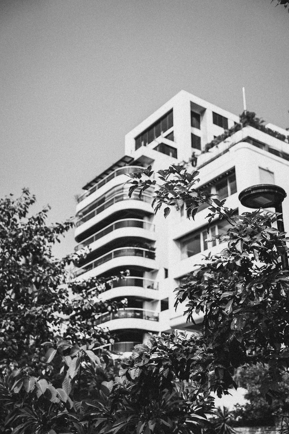 a black and white photo of a tall building