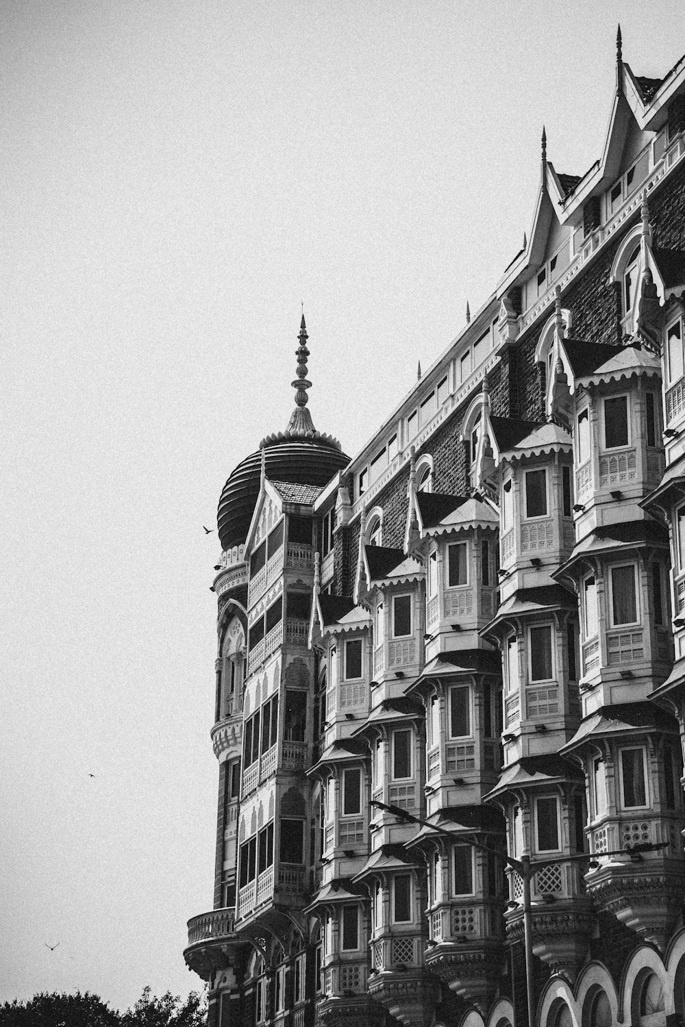 a black and white photo of a large building