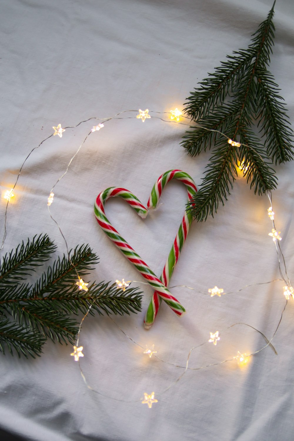 a candy cane in the shape of a heart