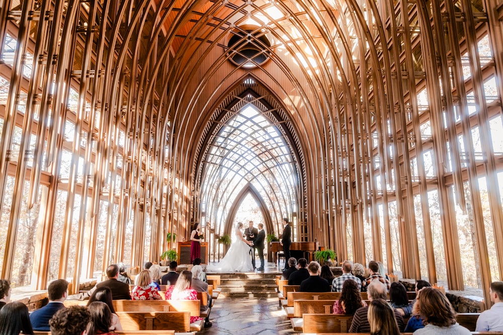 a couple getting married in a large cathedral