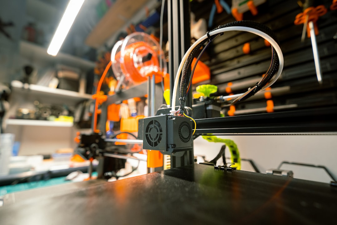 a close up of a machine that is on a table, 3d printer, home factory prototype