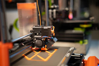 a close up of a machine with wires attached to it