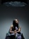 a woman sitting on a chair in a room