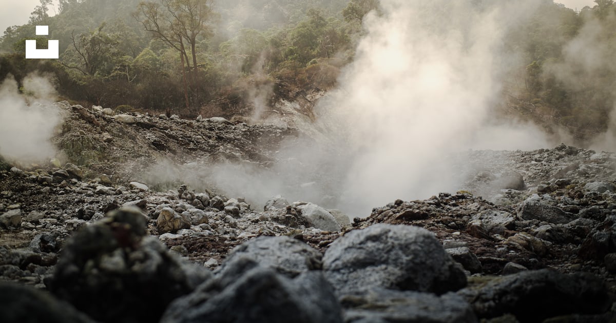 Steam rises from the ground in a rocky area photo – Free Vegetation ...