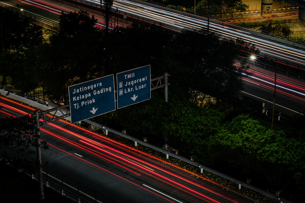 an overhead view of a highway at night