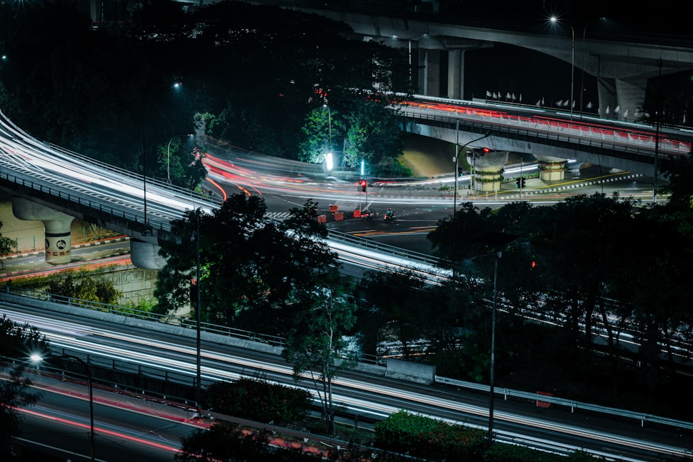 a view of a highway at night with a lot of lights