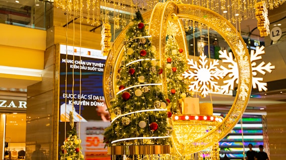 a christmas tree in the middle of a shopping mall