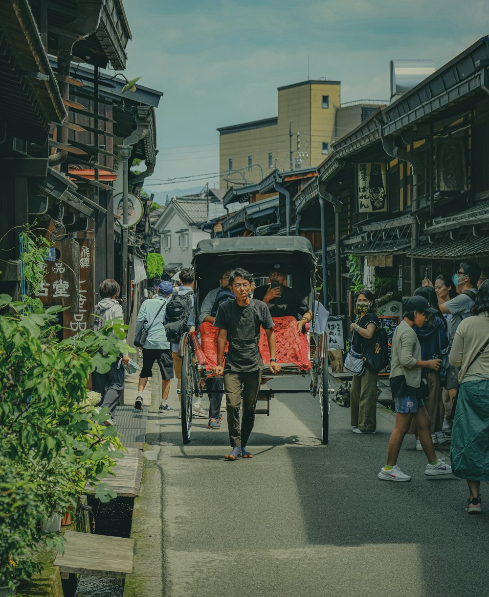 a group of people walking down a street