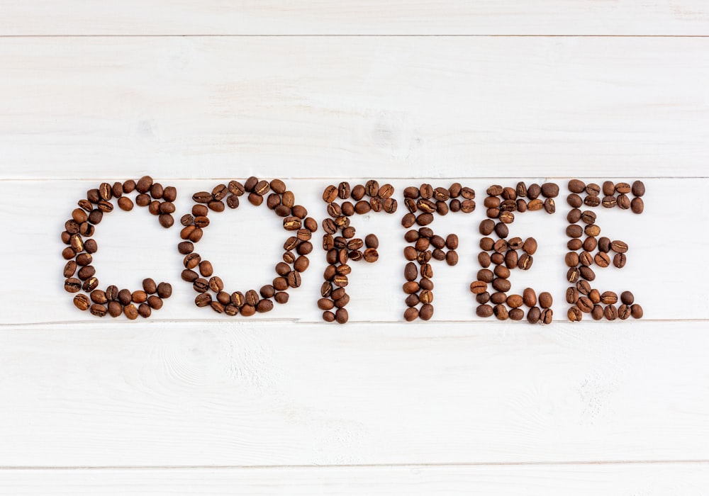 a word made out of coffee beans on a white background