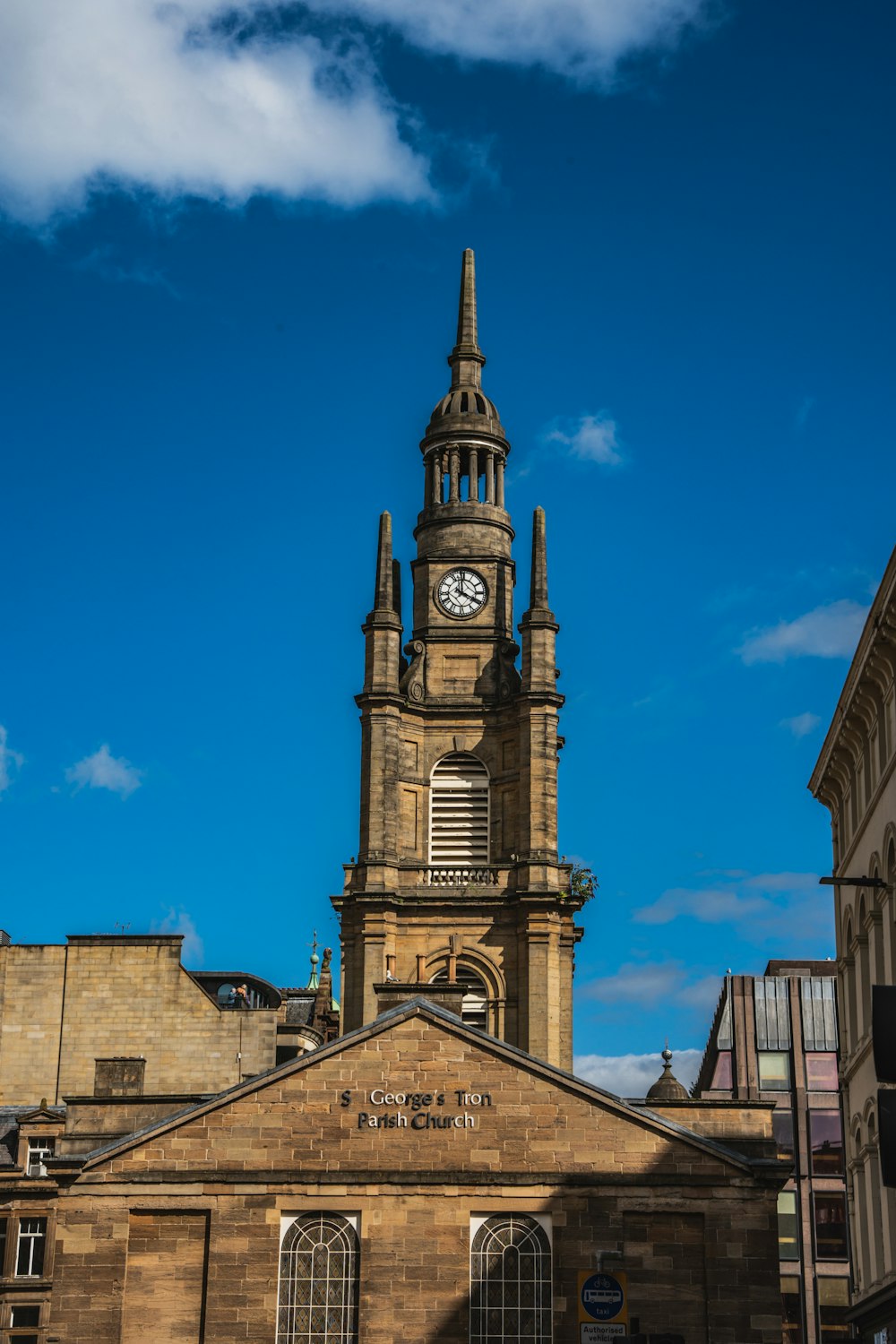 a tall tower with a clock on top of it