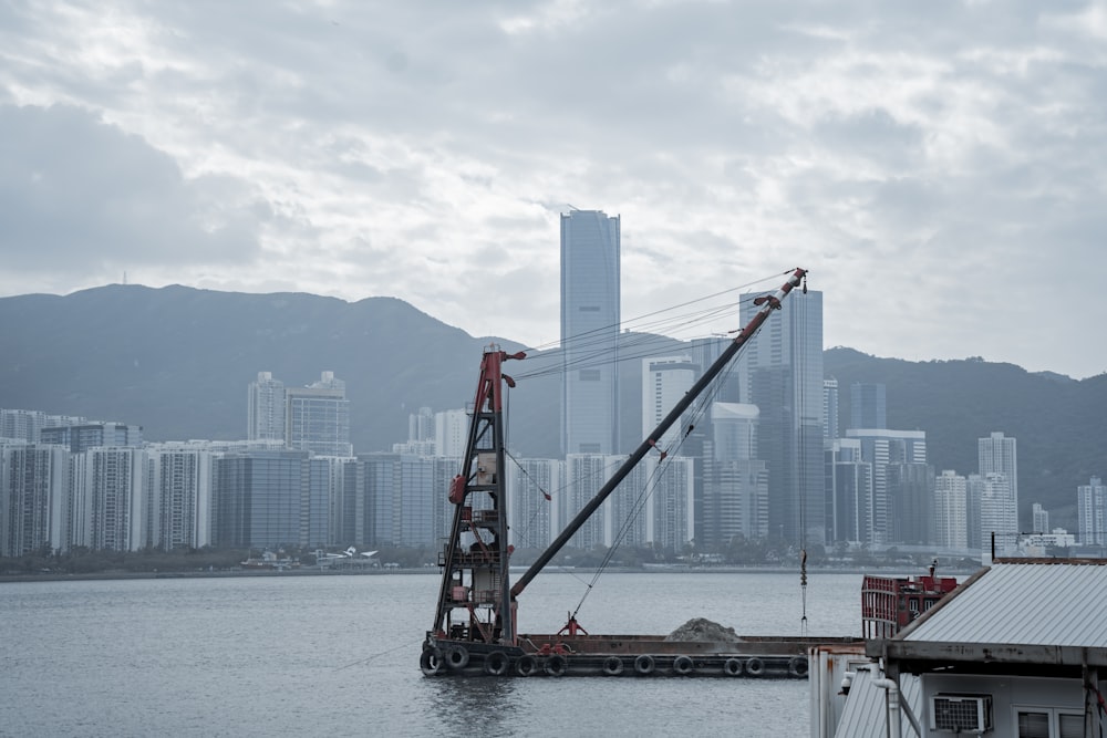 a crane is in the middle of a body of water