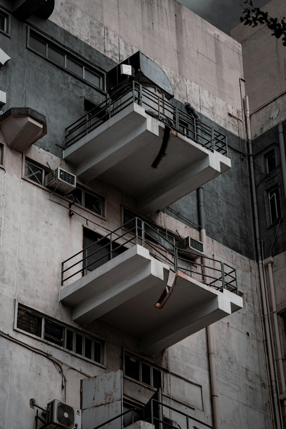 a tall building with balconies and balconies on it