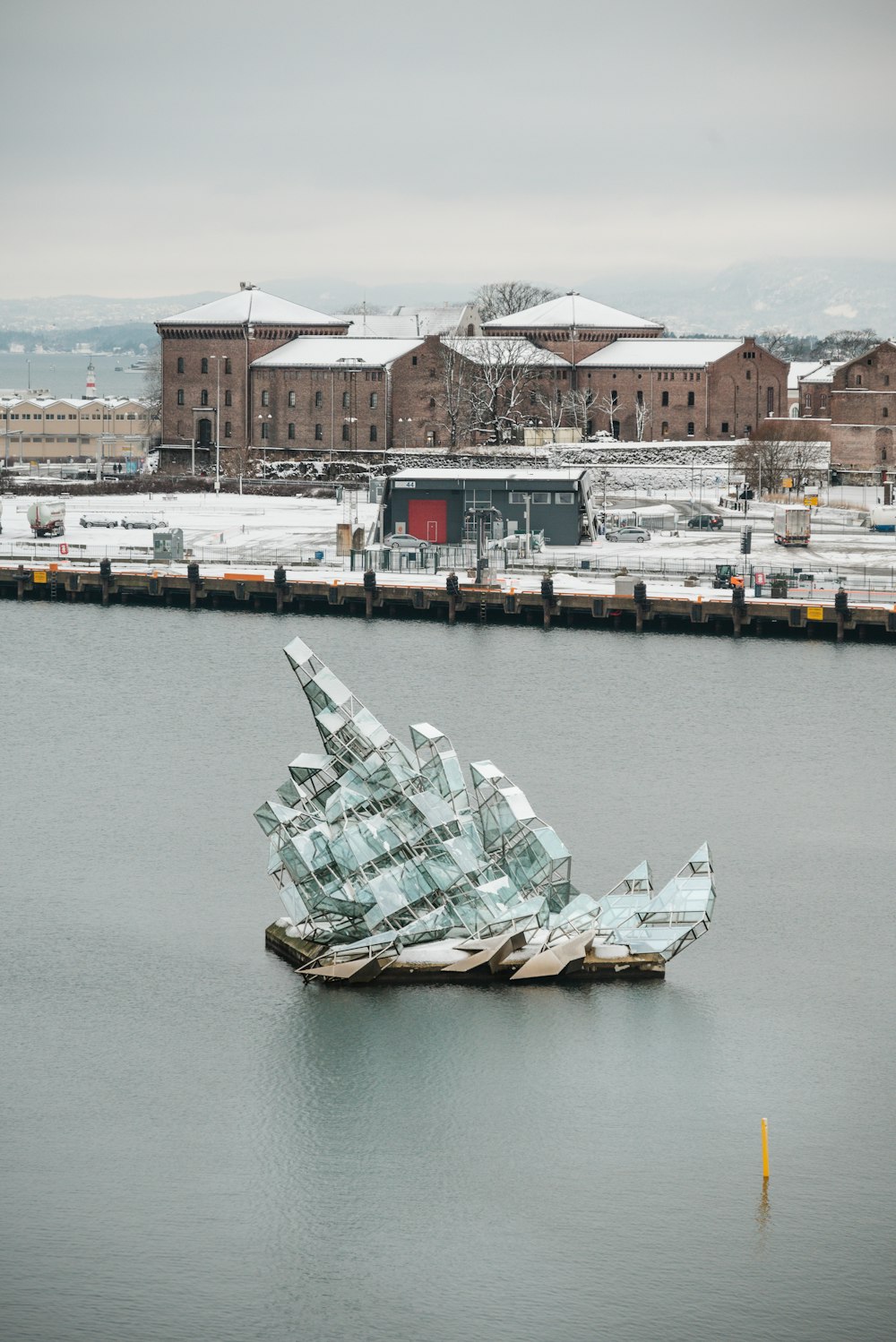 a large metal object floating on top of a body of water