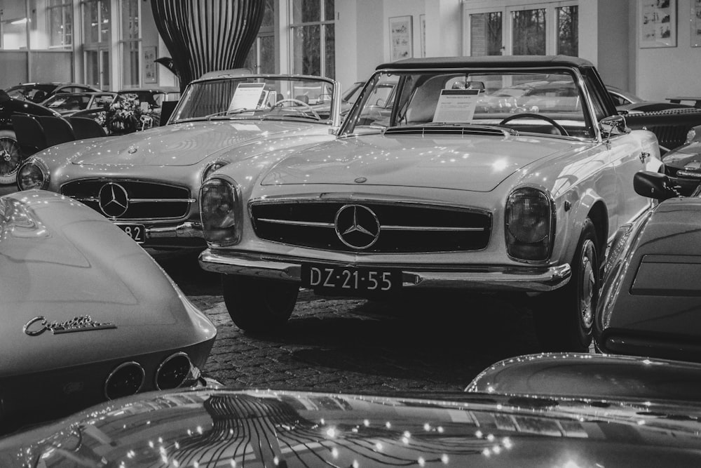 a black and white photo of a bunch of cars