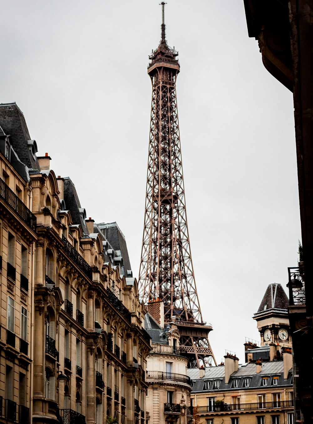 the eiffel tower towering over the city of paris